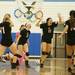 The Huron team celebrates after winning a point against Skyline on Tuesday. Coach Toney Cummer says once the team loosened up and refocused, they were able to play at a fast tempo. Daniel Brenner I AnnArbor.com